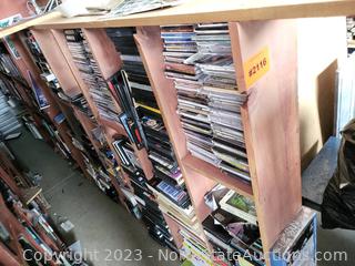 Shelf With CDs , DVDs, and VHS(270)
